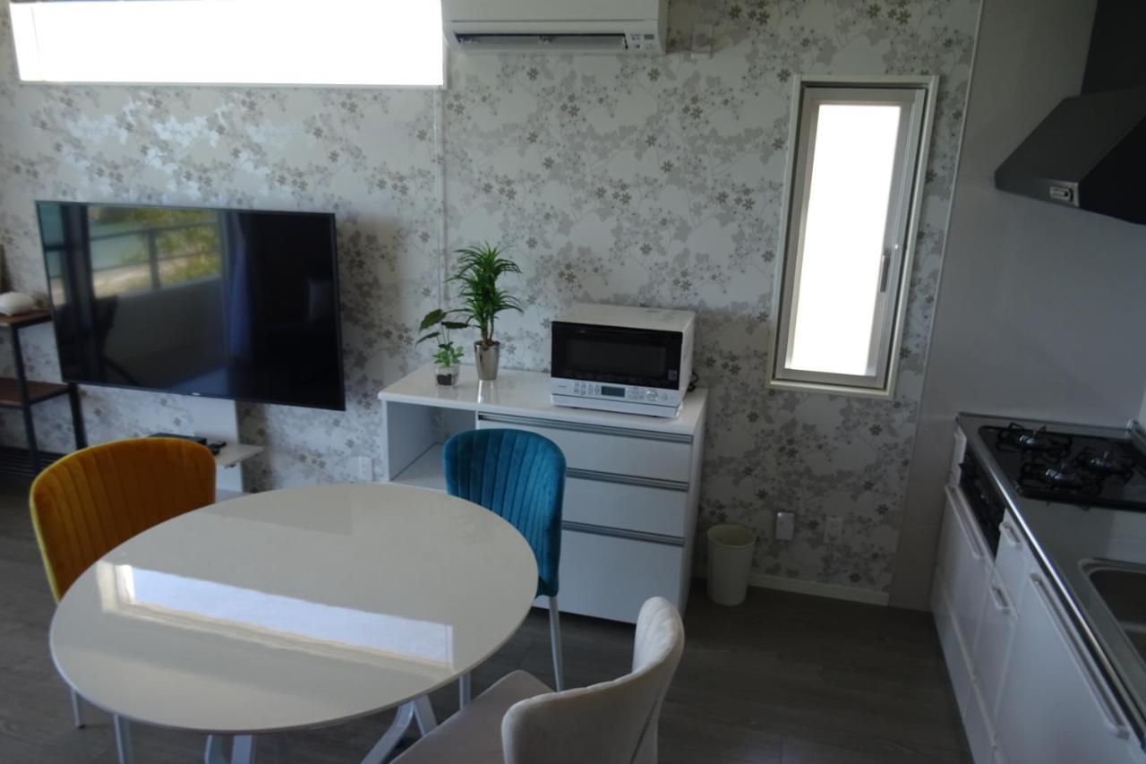 Ocean Front Sumuide Apartment Nago Exterior photo