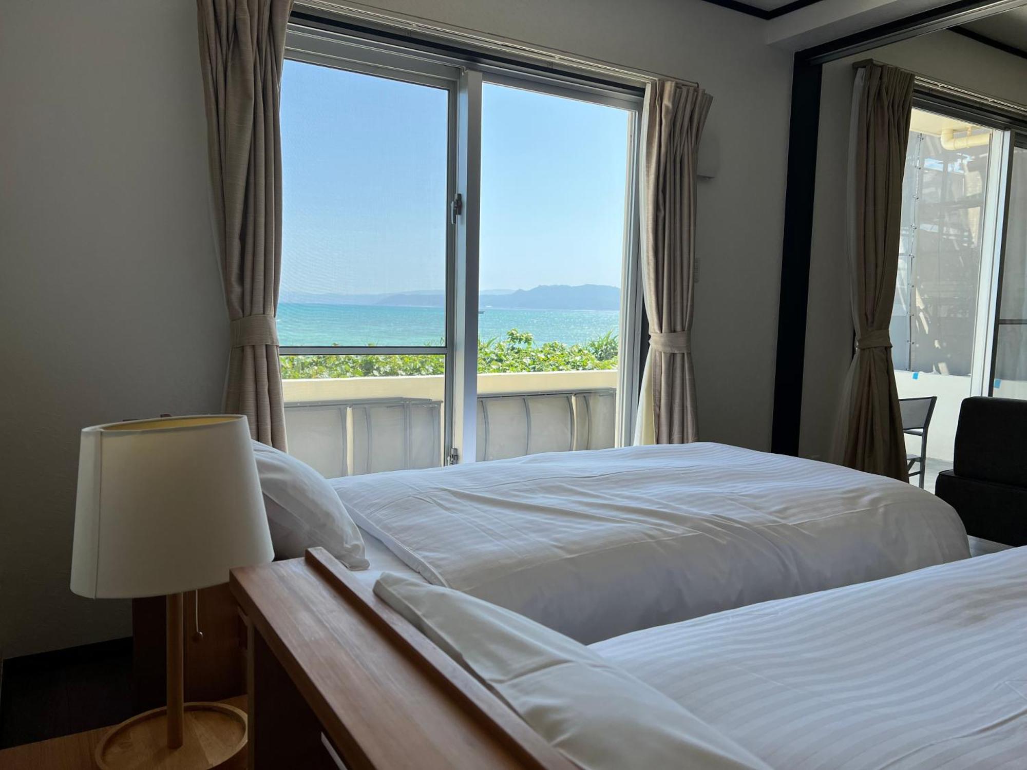 Ocean Front Sumuide Apartment Nago Exterior photo