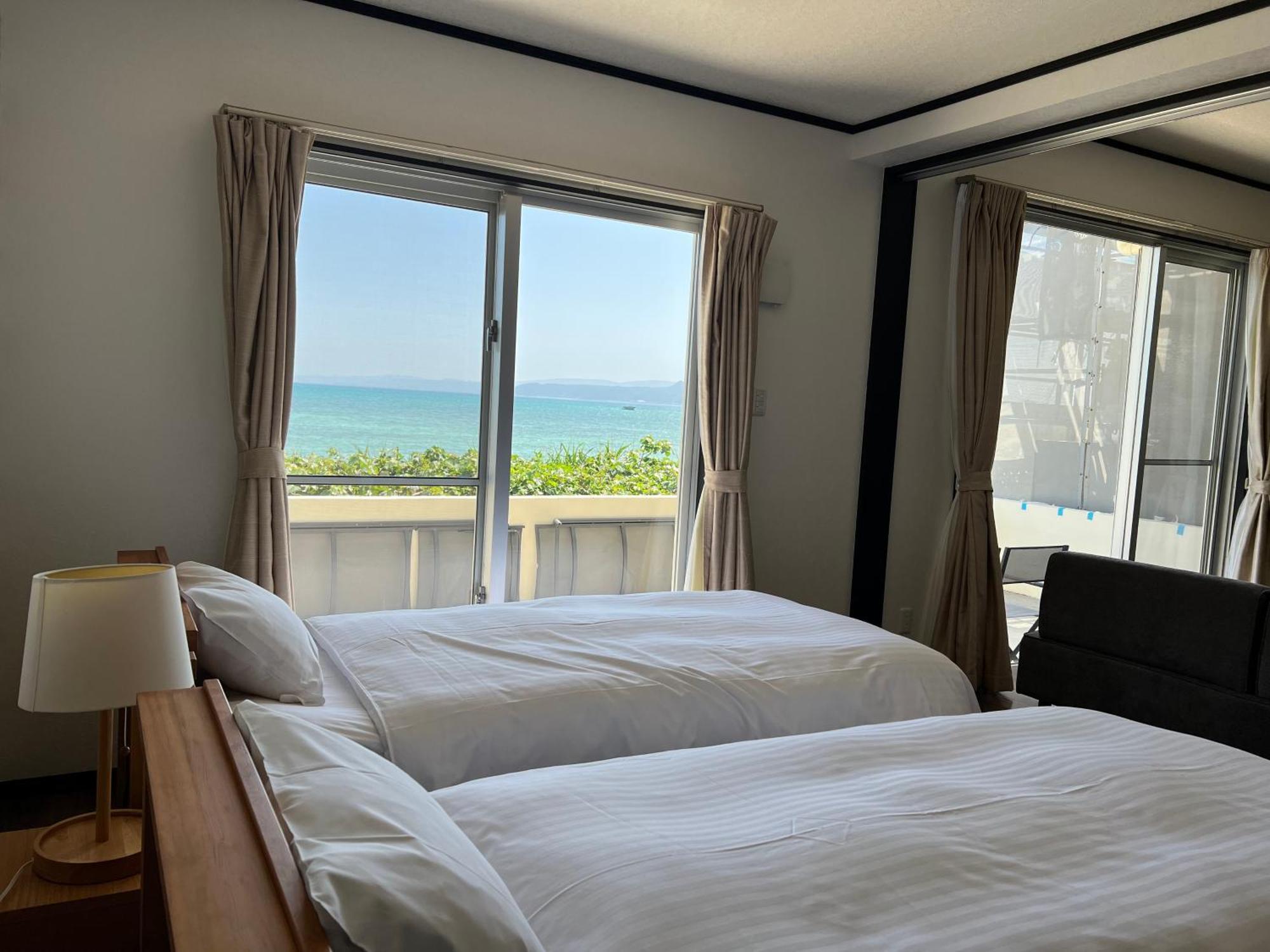 Ocean Front Sumuide Apartment Nago Exterior photo